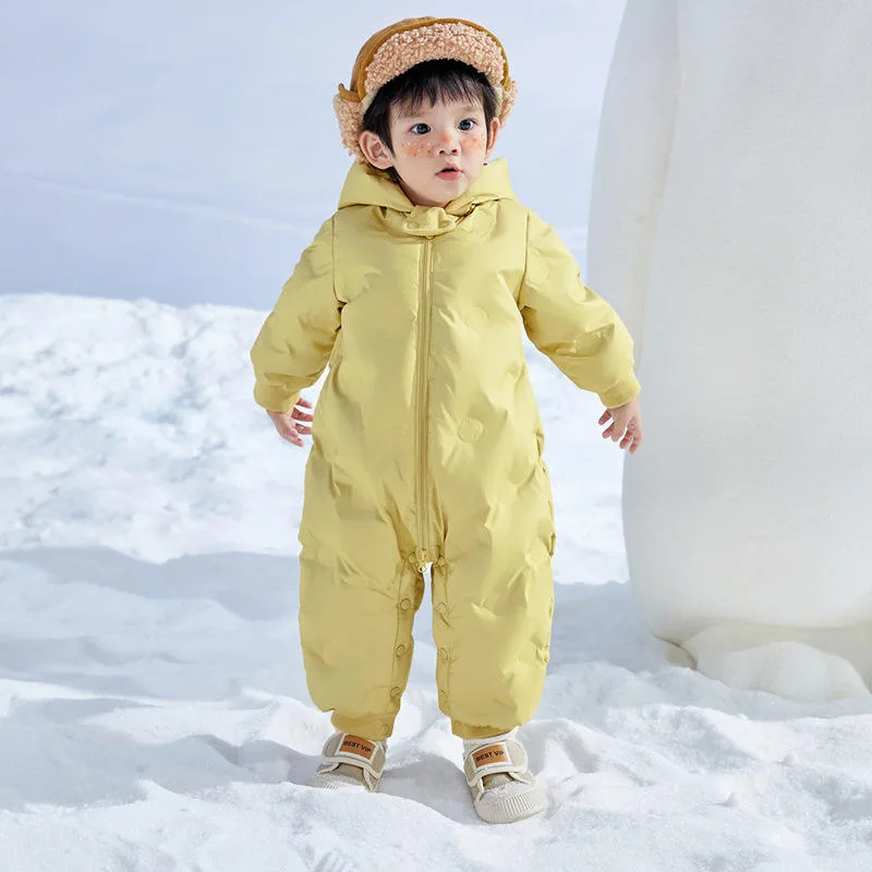 Baby down jumpsuit — Yellow, on model in the snow