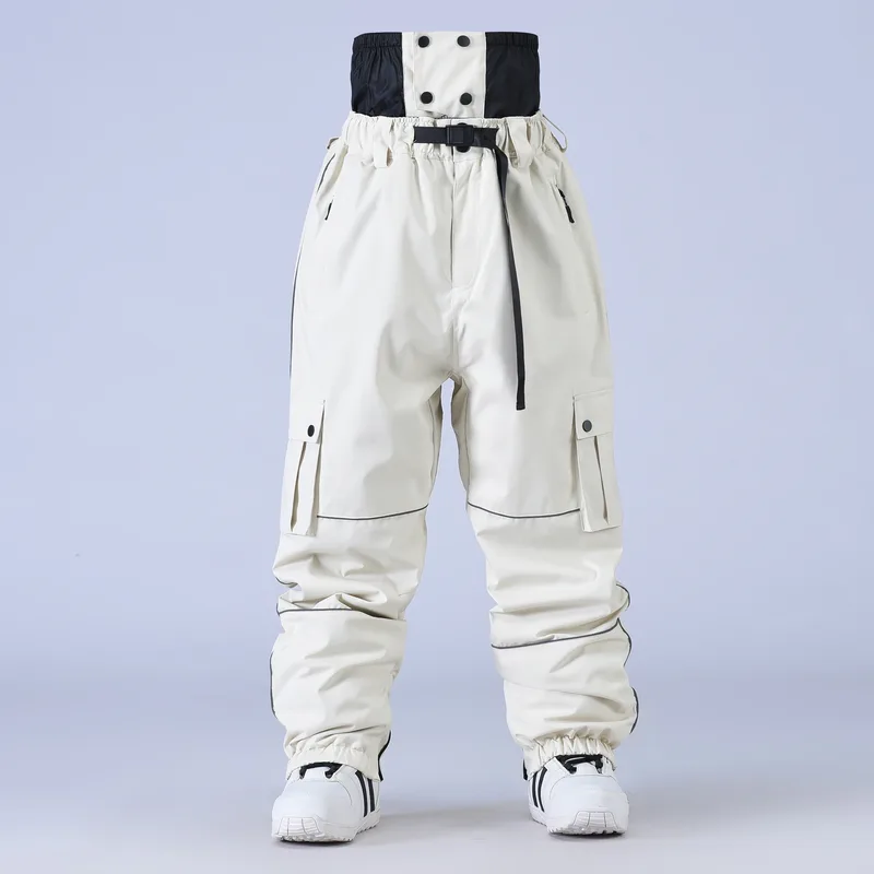 Unisex baggy snowboard pants in Light Khaki — baggy fit with cargo pockets and reflective trim, worn by a model