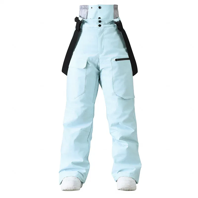 Unisex insulated bib pants in Light Blue — high bib front and cargo pockets, flat lay