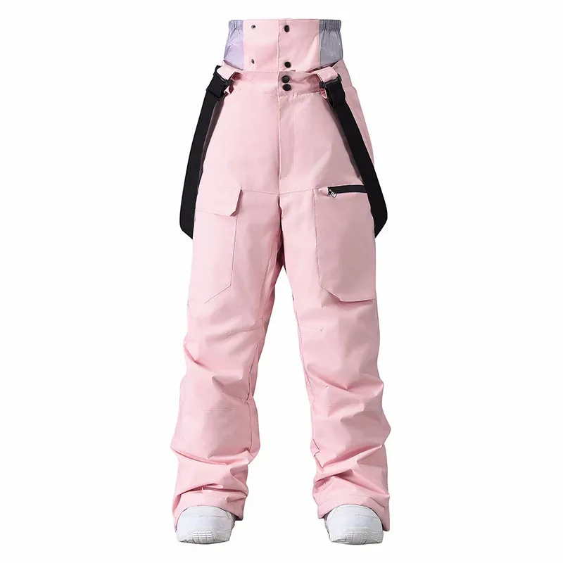 Unisex insulated bib pants in Pink — high bib front and cargo pockets, flat lay
