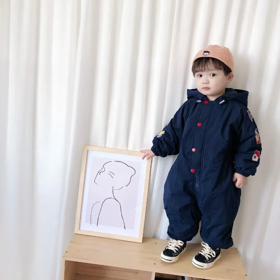 Kids' cotton-padded cartoon one-piece ski suit — Navy, on model