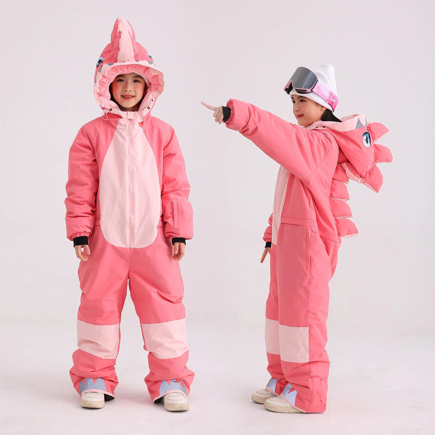 Kids' dinosaur one-piece ski suit — Pink, front and side