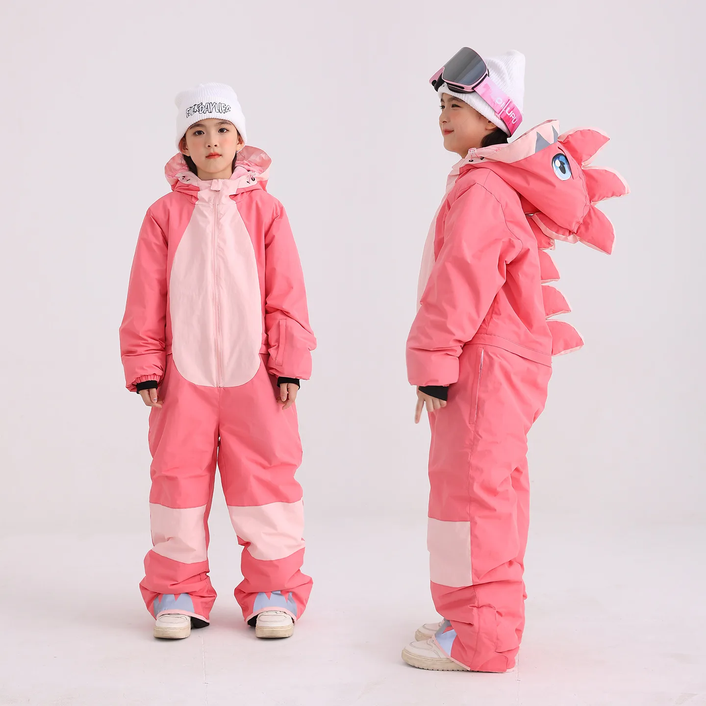 Kids' dinosaur one-piece ski suit — Pink, front and back
