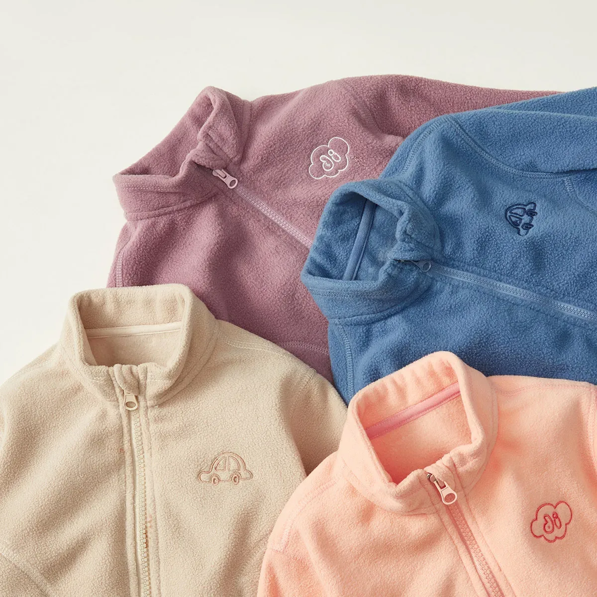 Kids' Melange Fleece Jacket — Five colourways, folded stack