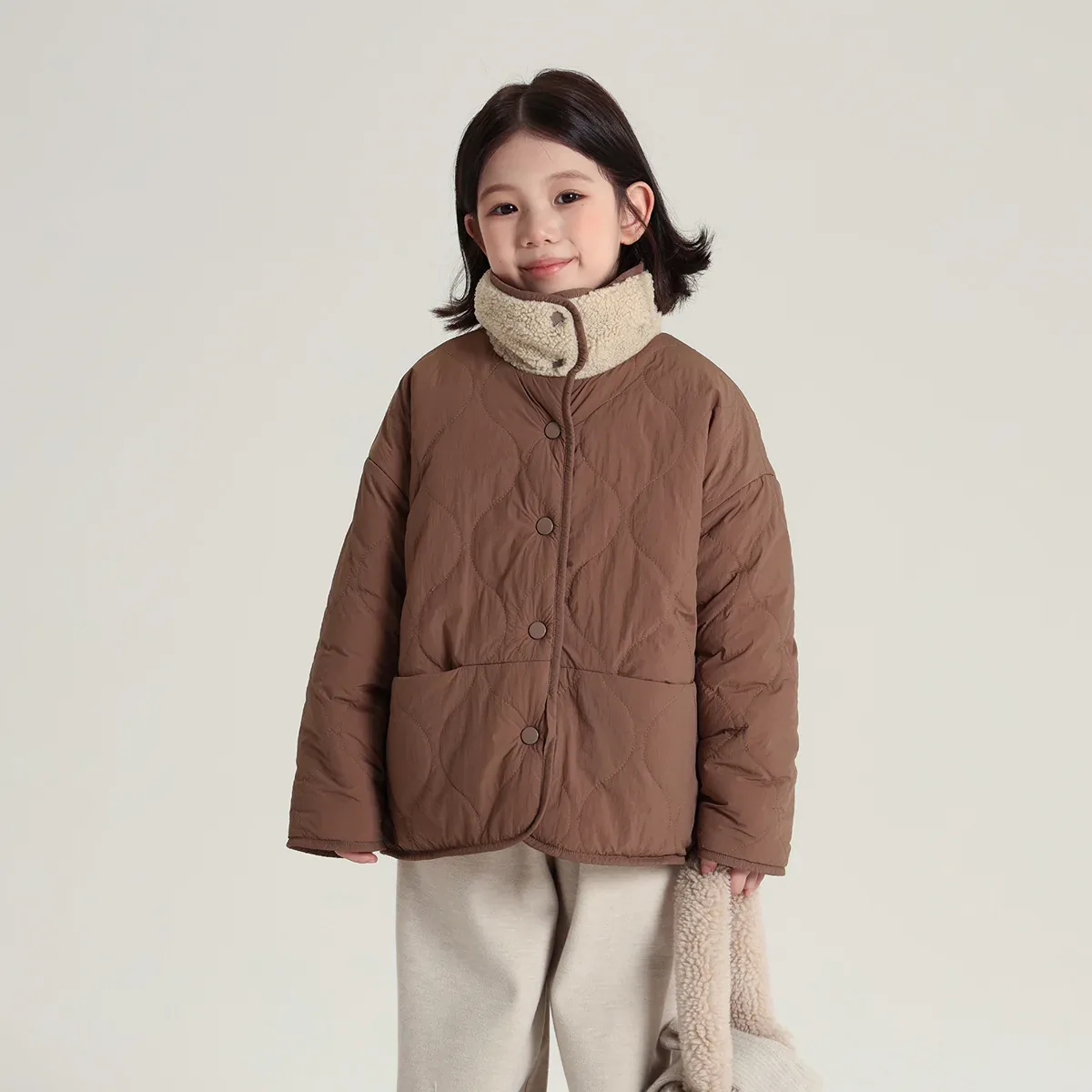 Kids' Reversible Quilted Fleece Jacket — 2 Colourways — Coffee, quilted face, worn view