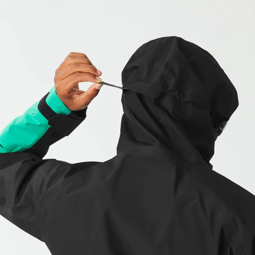 Men's 3-Layer Hardshell Jacket — Black/Green — Black/Green, hood drawcord, worn back view