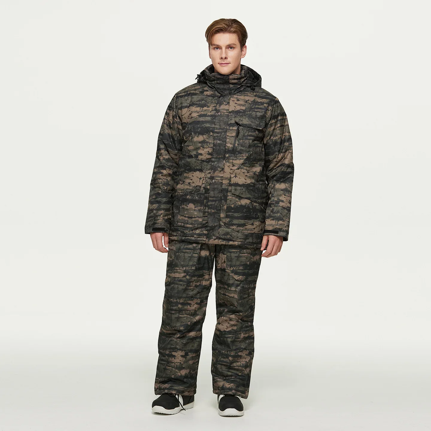 Men's camo ski set — dark camo — insulated jacket and bib pants on a model