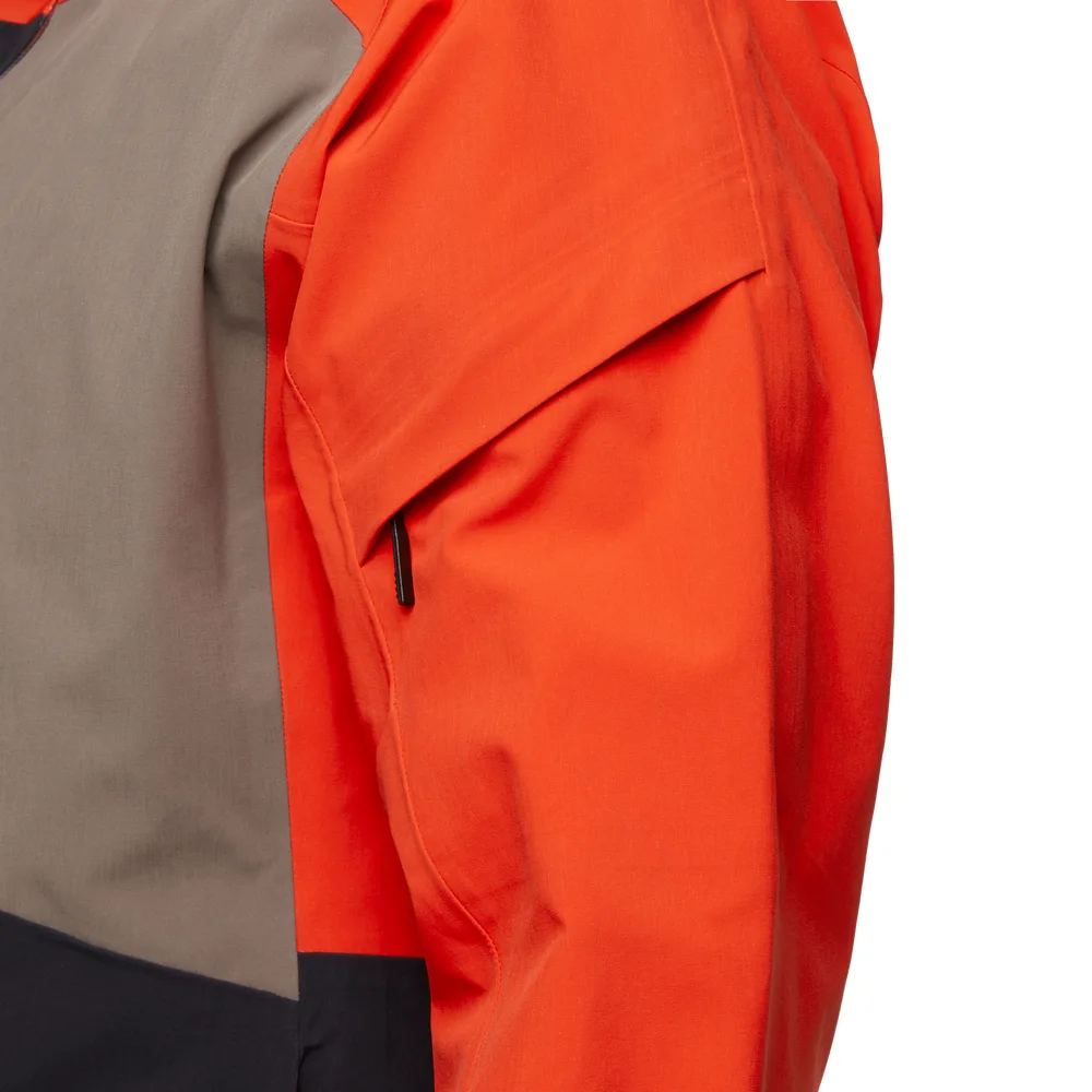 Close-up of a zipped sleeve pocket on a men’s shell ski jacket with a waterproof, breathable coating