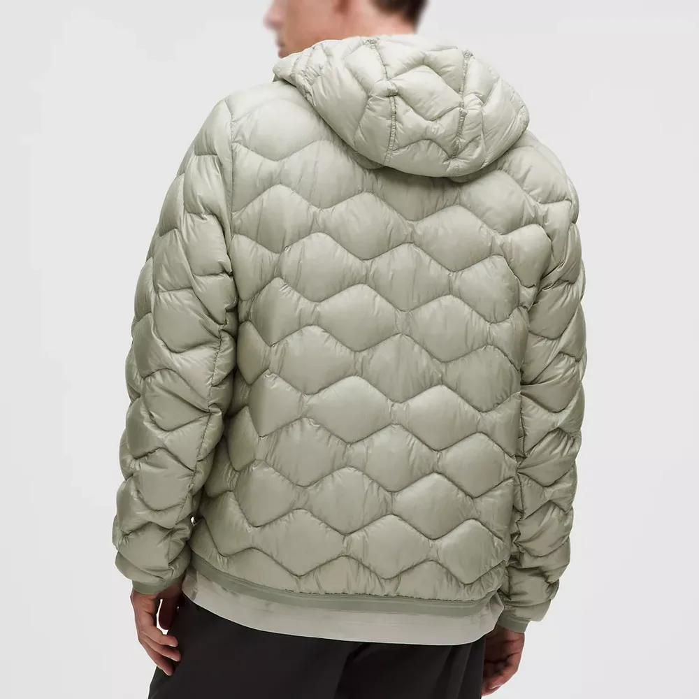 Men’s Hooded Puffer Jacket — Fog Green & Rockwood — Fog Green, back view, worn