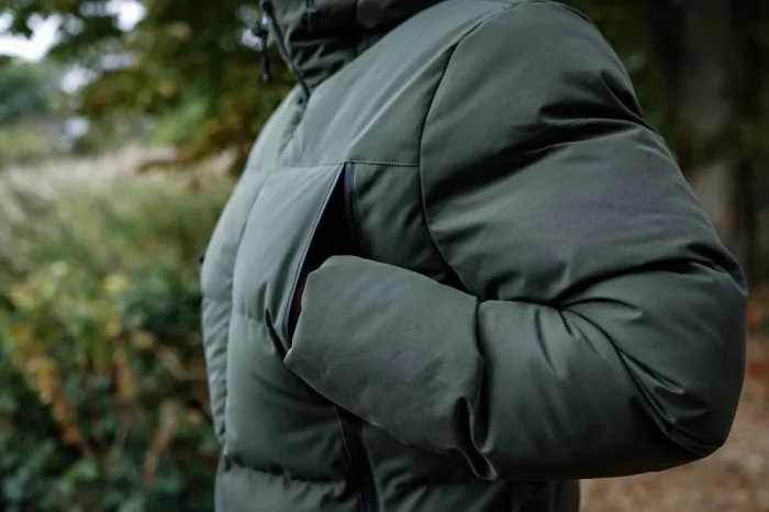 Men’s Hooded Quilted Jacket — Olive Green — Olive Green, side detail, worn outdoors