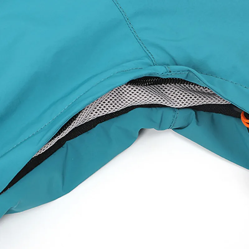 Men's One-Piece Ski Suit — Teal — 1 Colourway — Teal, hem mesh lining close-up