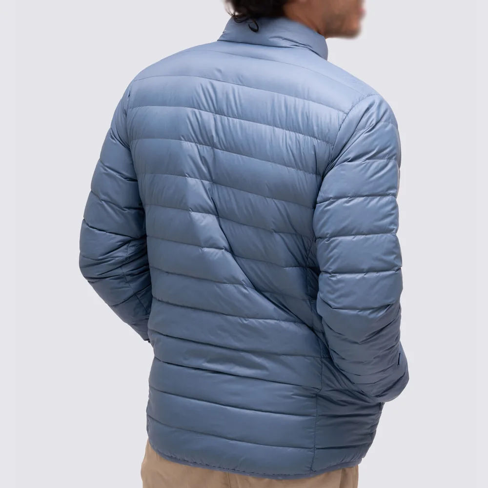 Men’s Puffer Jacket — Navy Blue, Army Green, Dusty Blue & Caramel Brown — Dusty Blue, back view, worn