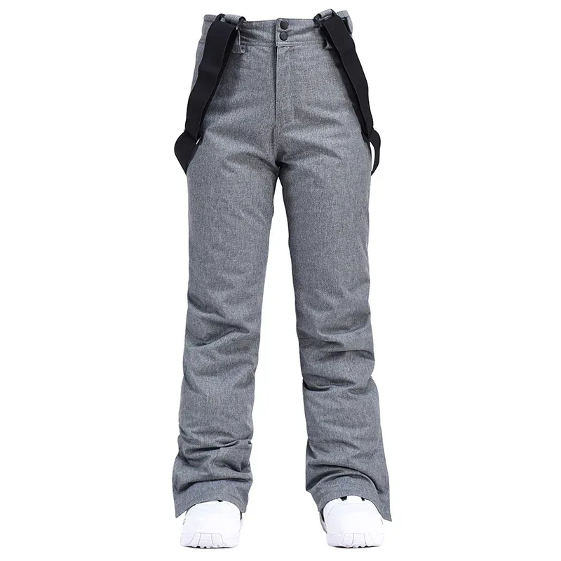 Unisex ski bib pants in Charcoal Grey — adjustable suspenders and a straight leg, flat lay