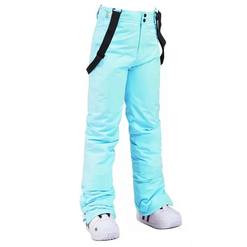 Unisex ski bib pants in Light Blue — adjustable suspenders and a straight leg, flat lay