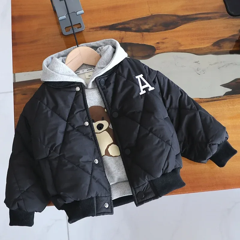 Toddlers' A-Line Quilted Jacket — Black, worn over a hoodie