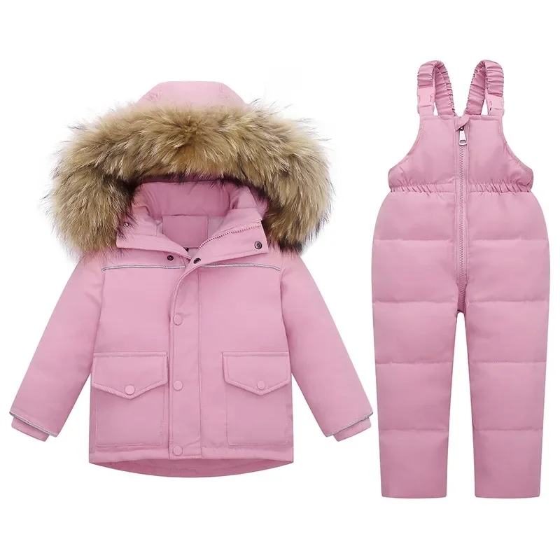 Toddler two-piece ski set in soft pink — insulated jacket with faux-fur trimmed hood and matching bib pants