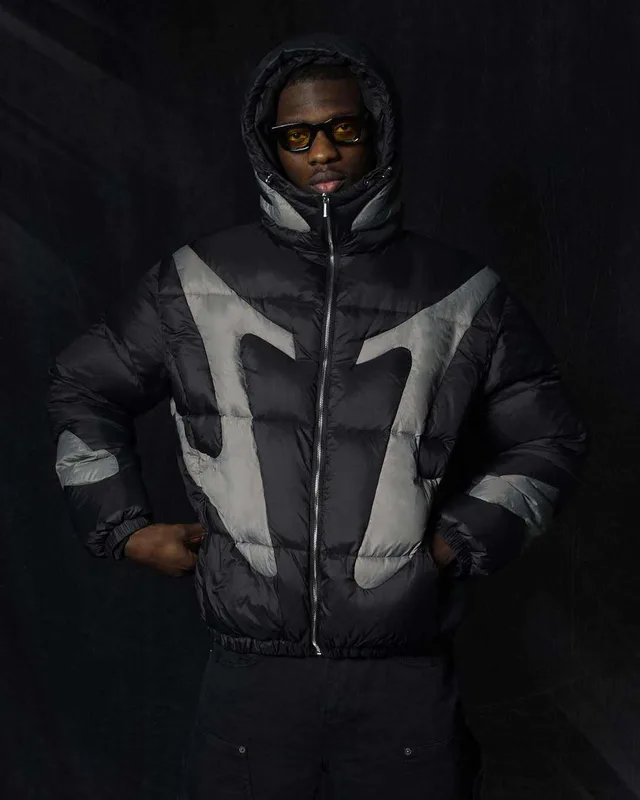 Unisex Abstract-Panel Puffer Jacket — 2 Colourways — Black & Grey, worn front view, hood up