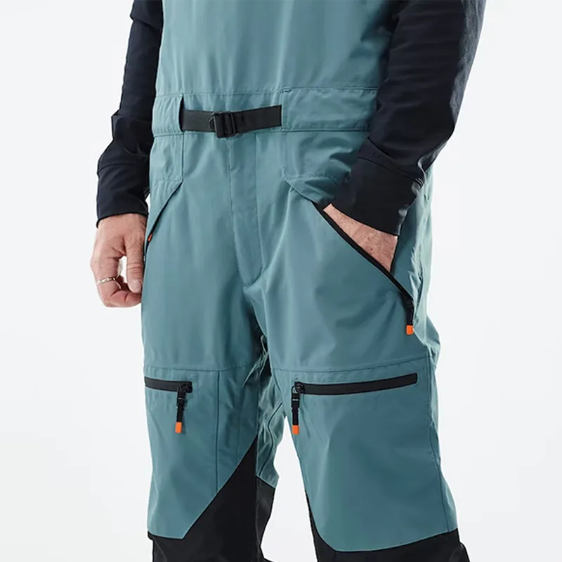 Unisex Adjustable-Strap Ski Bib — 4 Colourways — Teal, leg pocket close-up
