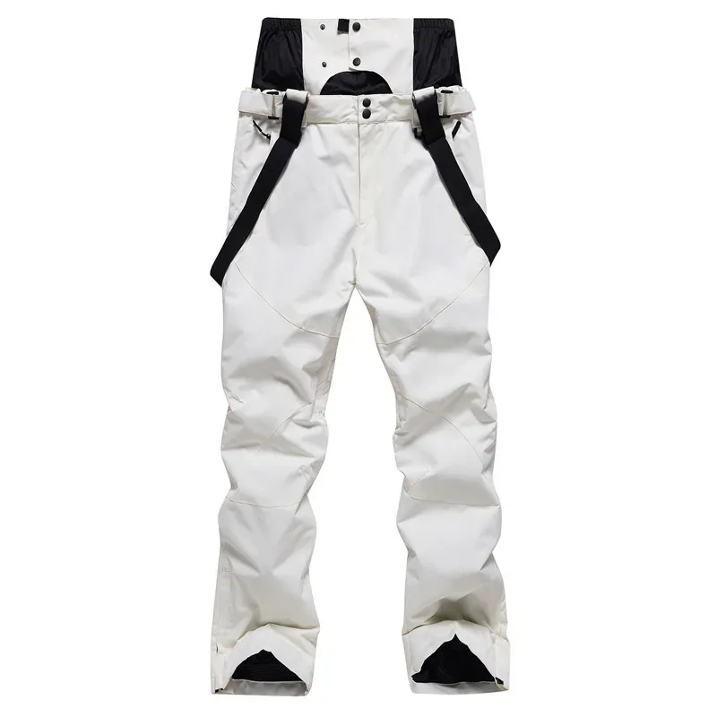 Unisex ski bib pants in Beige — adjustable suspenders and a relaxed leg, flat lay