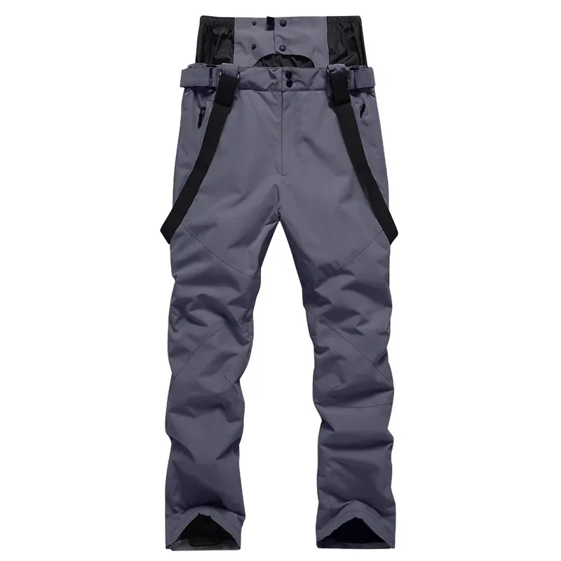 Unisex ski bib pants in Grey — adjustable suspenders and a relaxed leg, flat lay