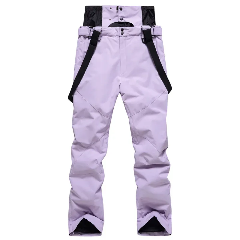 Unisex ski bib pants in Light Purple — adjustable suspenders and a relaxed leg, flat lay