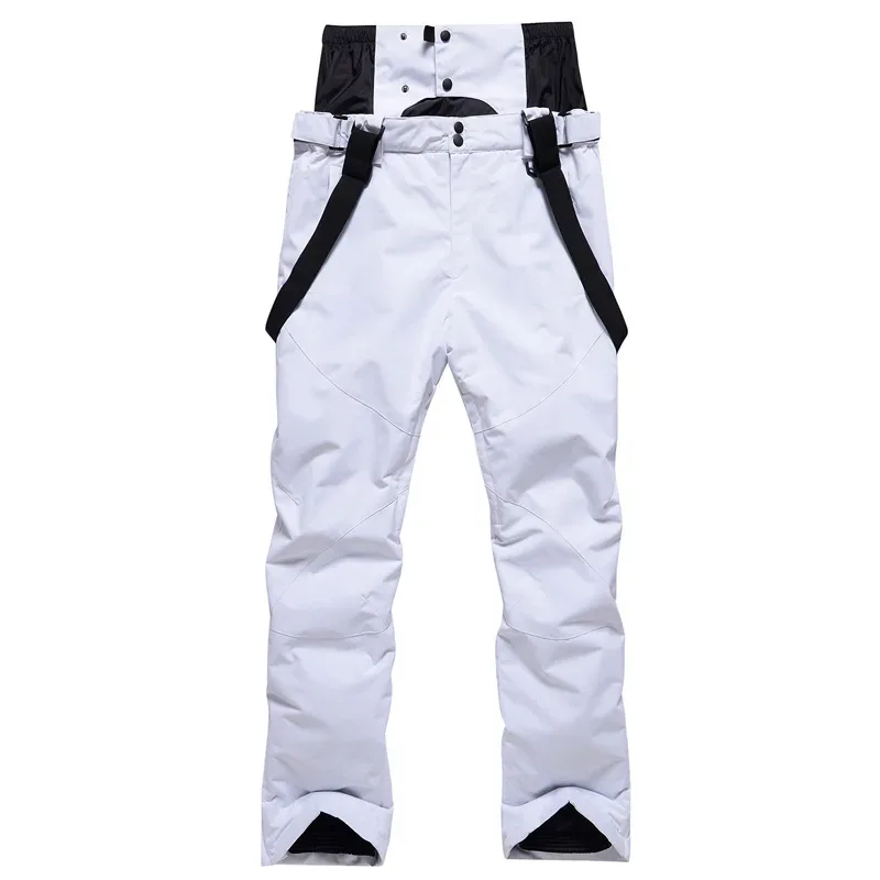 Unisex ski bib pants in White — adjustable suspenders and a relaxed leg, flat lay