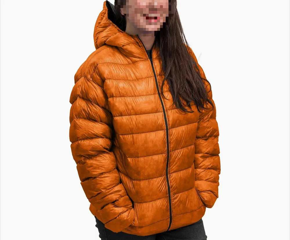 Unisex Hooded Puffer Jacket — 3 Colourways — Orange-Caramel, front view on female model