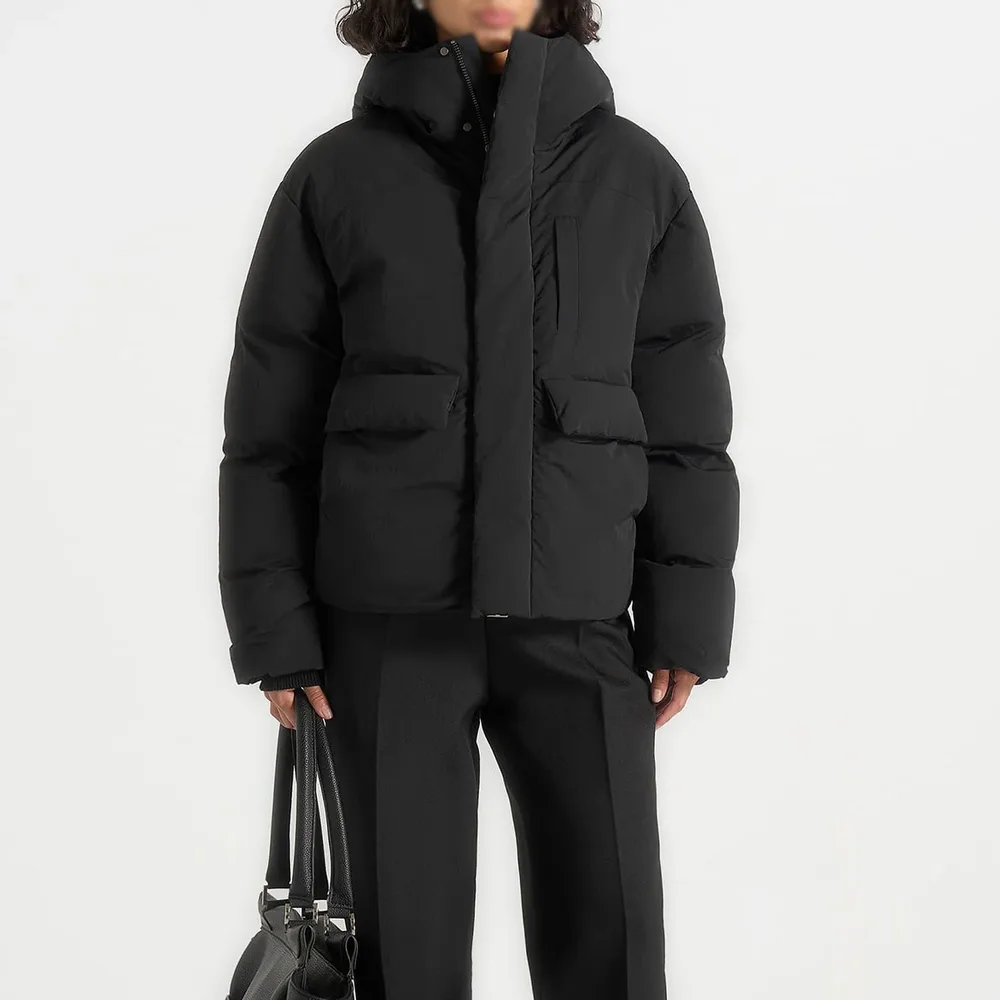 Unisex Hooded Puffer Jacket — Taupe & Black — Black, front view, worn