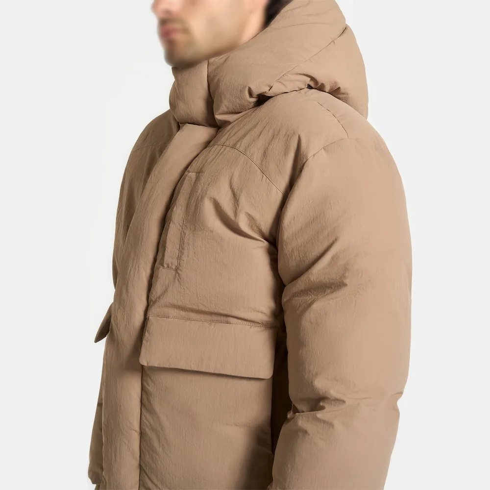 Unisex Hooded Puffer Jacket — Taupe & Black — Taupe, side view, worn