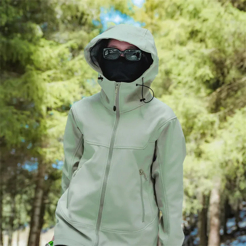 Unisex Hooded Softshell Jacket — Mint Green, worn outdoors