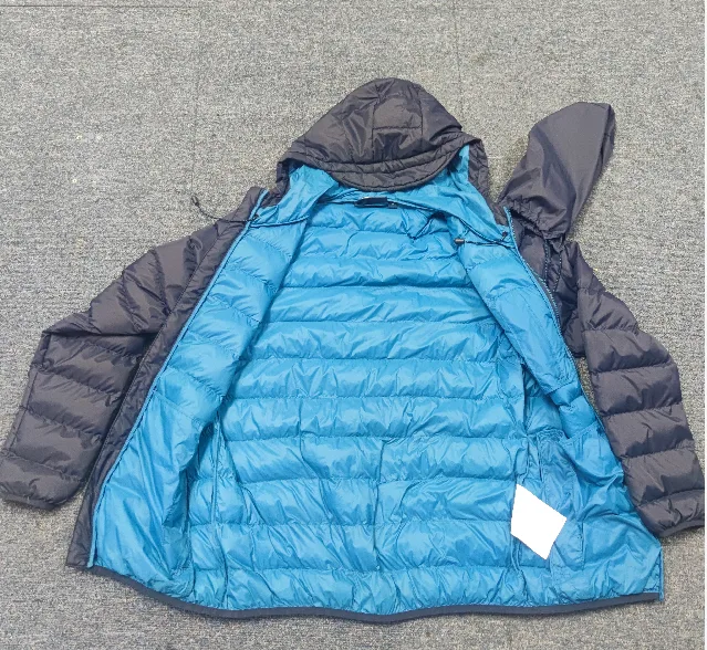 Unisex Lightweight Quilted Jacket — Navy & Grey — Grey, opened flat, lining view