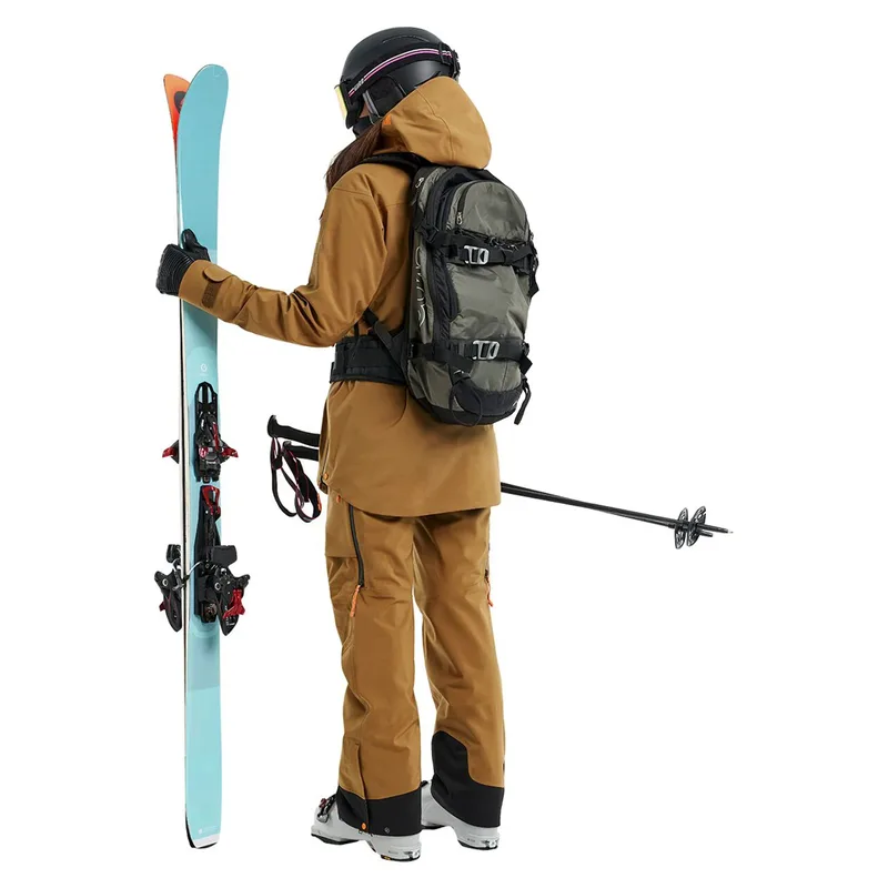 Unisex One-Piece Anorak Ski Suit — 2 Colourways — Brown, worn back view, outdoor with skis and backpack