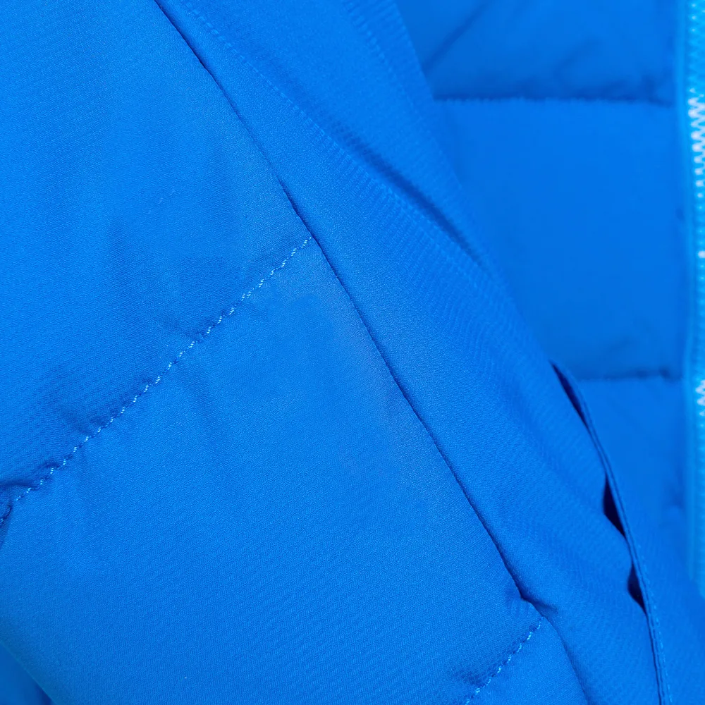 Unisex Quilted Jacket — Blue — Blue, fabric close-up