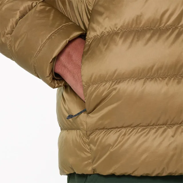 Unisex Quilted Jacket — Brown — Brown, pocket close-up, worn