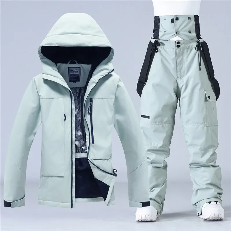 Unisex ski set in Light Green — insulated hooded jacket and ski pants