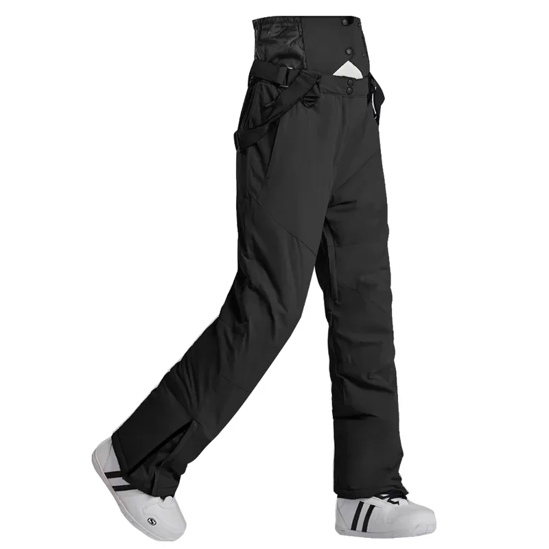 Unisex insulated ski pants in Black — regular waist and a clean leg, worn by a model