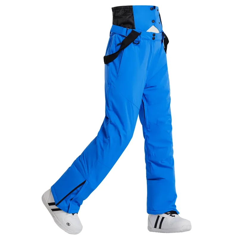 Unisex insulated ski pants in Blue — regular waist and a clean leg, worn by a model