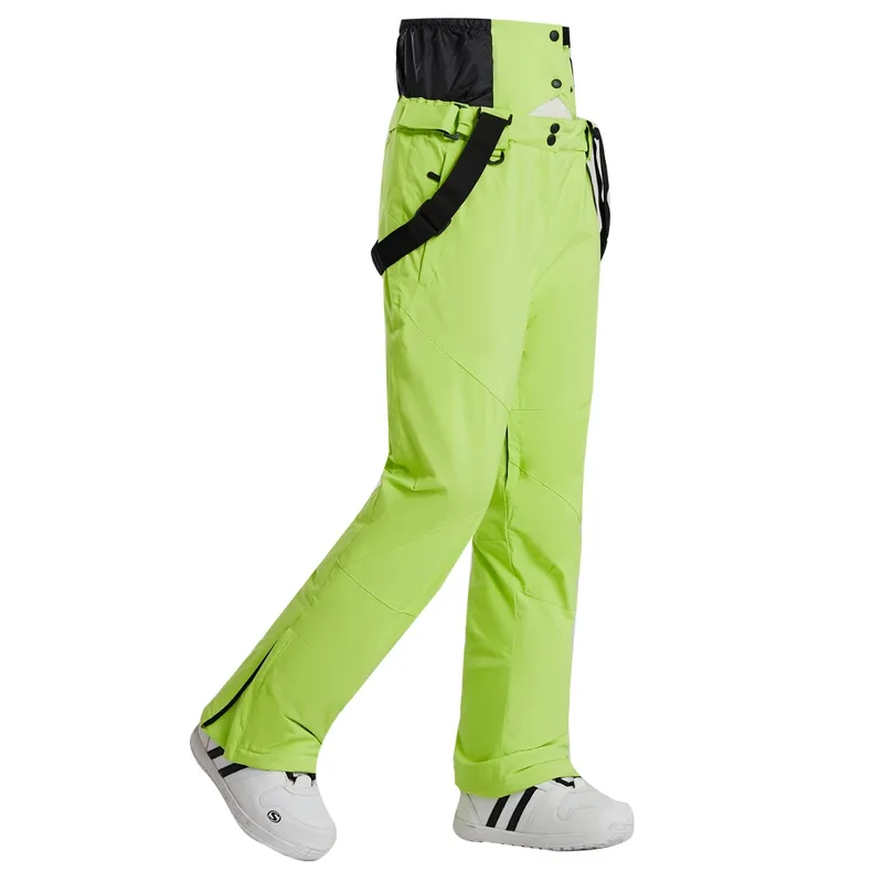 Unisex insulated ski pants in Fruit Green — regular waist and a clean leg, worn by a model