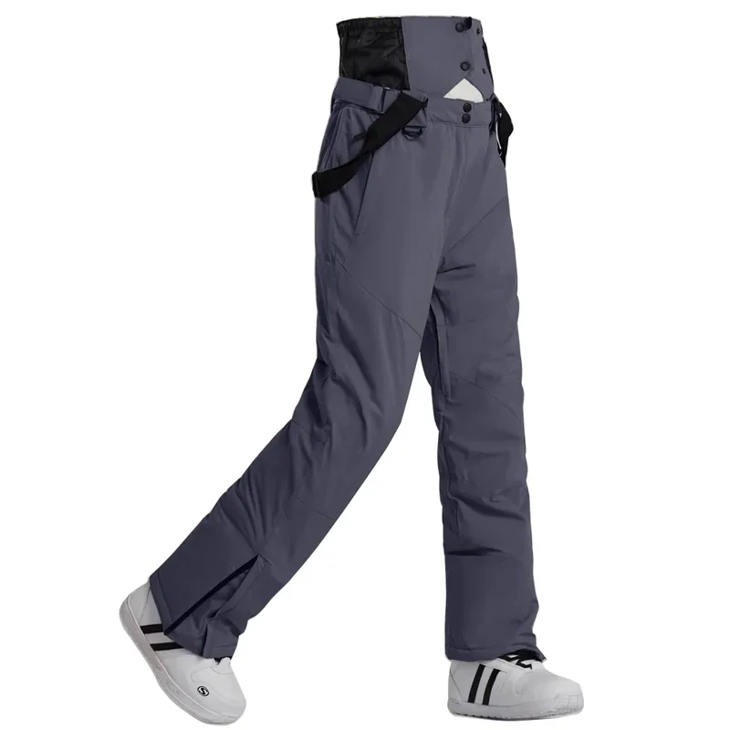 Unisex insulated ski pants in Grey — regular waist and a clean leg, worn by a model