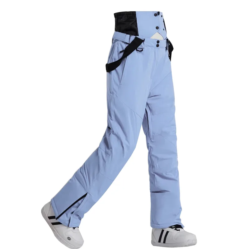 Unisex insulated ski pants in Light Blue — regular waist and a clean leg, worn by a model