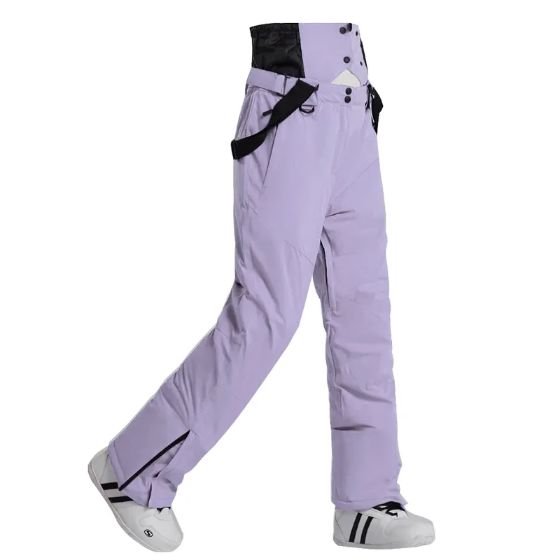 Unisex insulated ski pants in Light Purple — regular waist and a clean leg, worn by a model