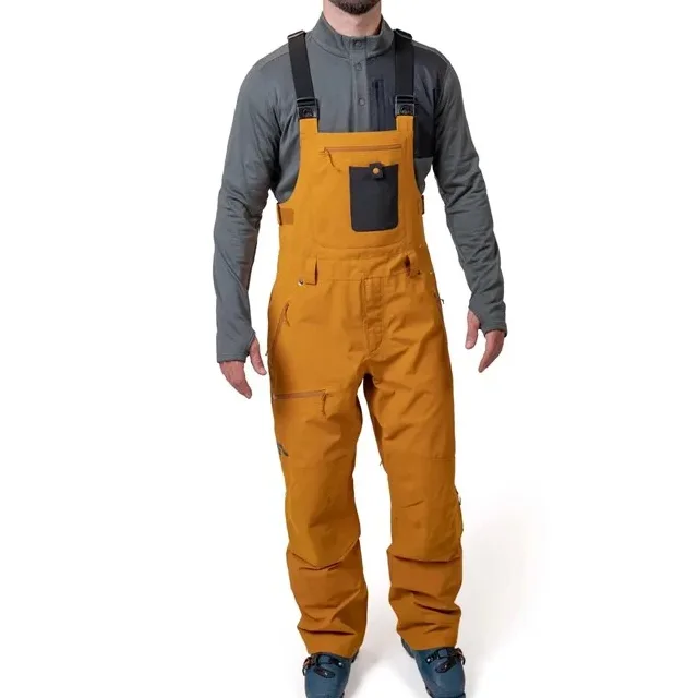 Unisex Snowboard Bib Pants — Mustard — Mustard — worn front view
