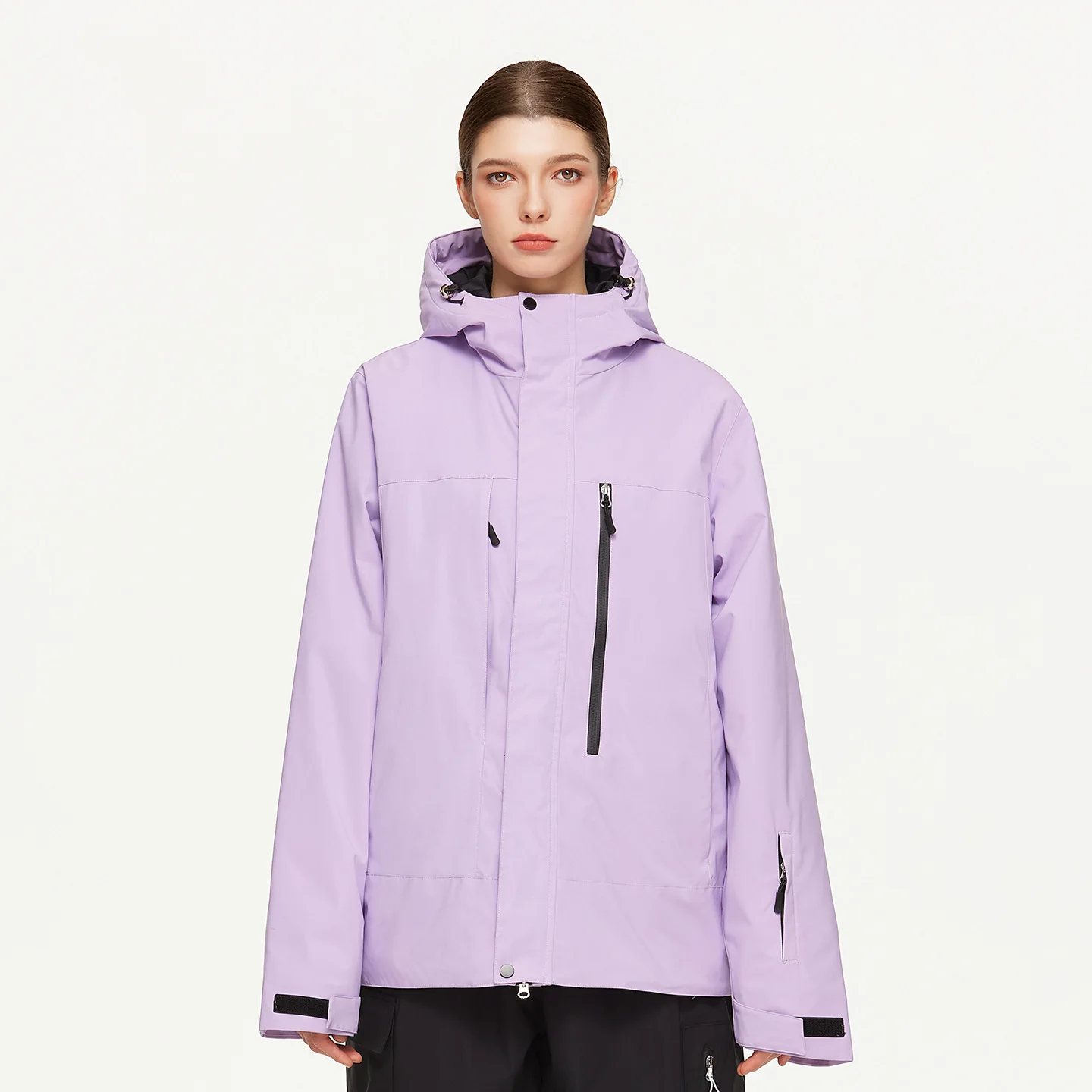 Woman wearing the women’s insulated ski jacket in Purple with PP cotton fill and an attached hood